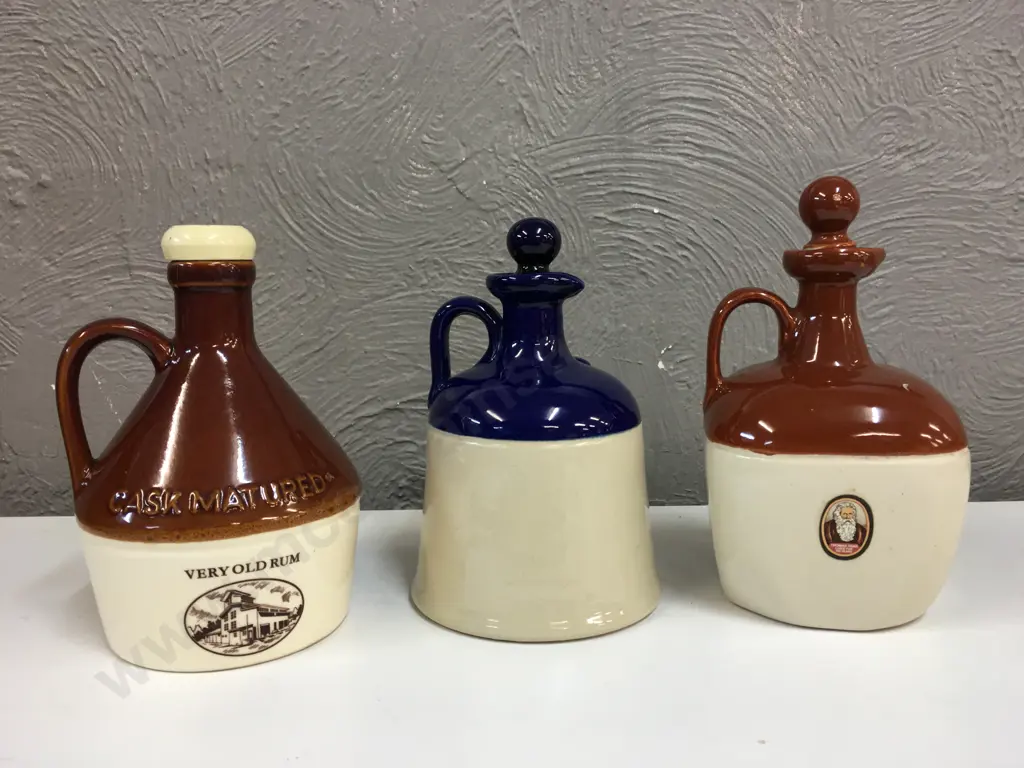 Selection Of Whiskey & Rum Stoneware Bottles Including Grand Old Parr, Grants & Beenleigh Rum Image 1++