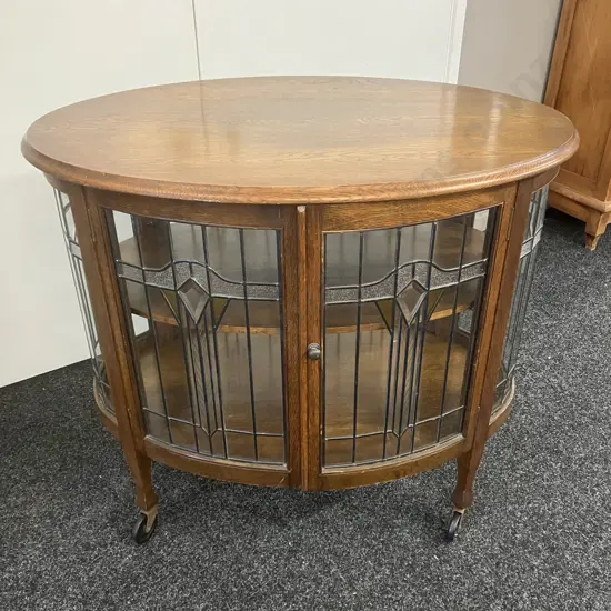 Art Deco Oak Leadlight 4 Door Oval Display Cabinet, Wooden Shelf, On Castors. H81 W89 D57cm (Has 1 x Tiny Crack In Glass