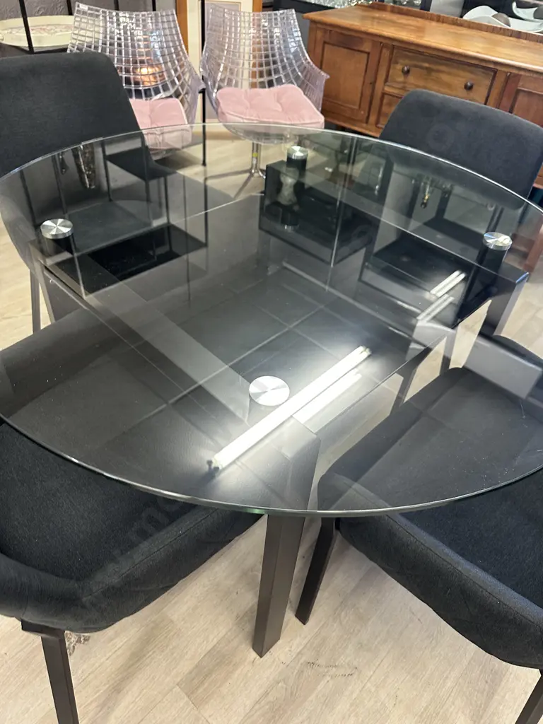 Round Clear Glass Table With Black Undershelf, Black Powder Coated Base 75x120cm & 4 Charcoal Luna Carver Dining Chairs Image 1++
