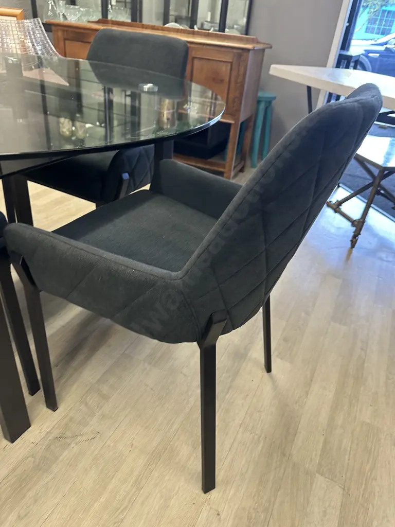 Round Clear Glass Table With Black Undershelf, Black Powder Coated Base 75x120cm & 4 Charcoal Luna Carver Dining Chairs Image 1++