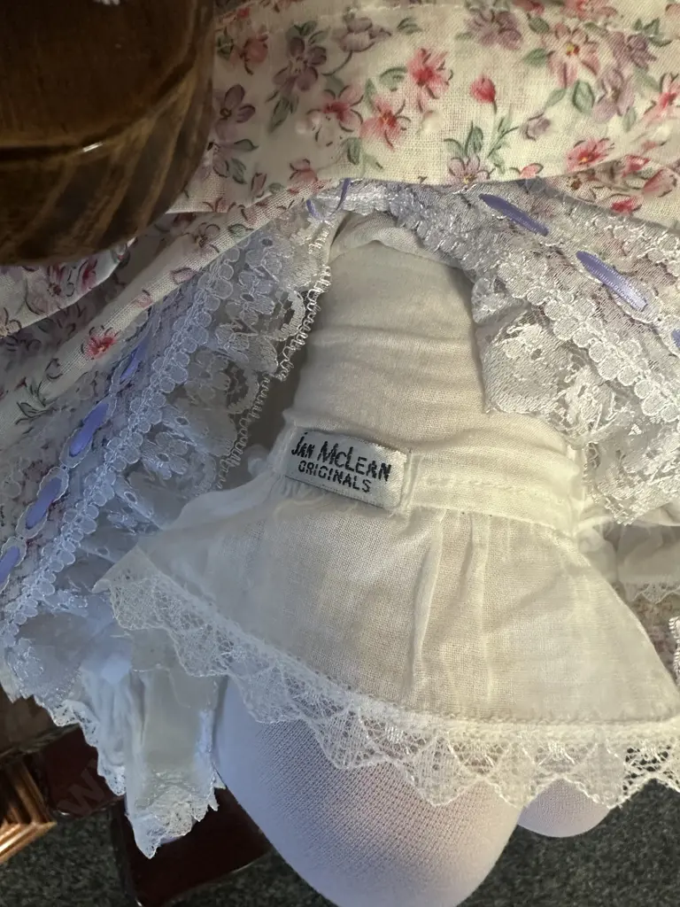 Vintage Porcelain Doll Sitting On Minature Colonial ChairWith Legs Crossed Dressed By Jan Mclean Designers Image 1++