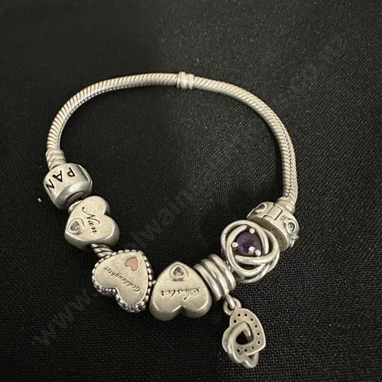 Pandora Bracelet With Assorted Charms Including Pandora
