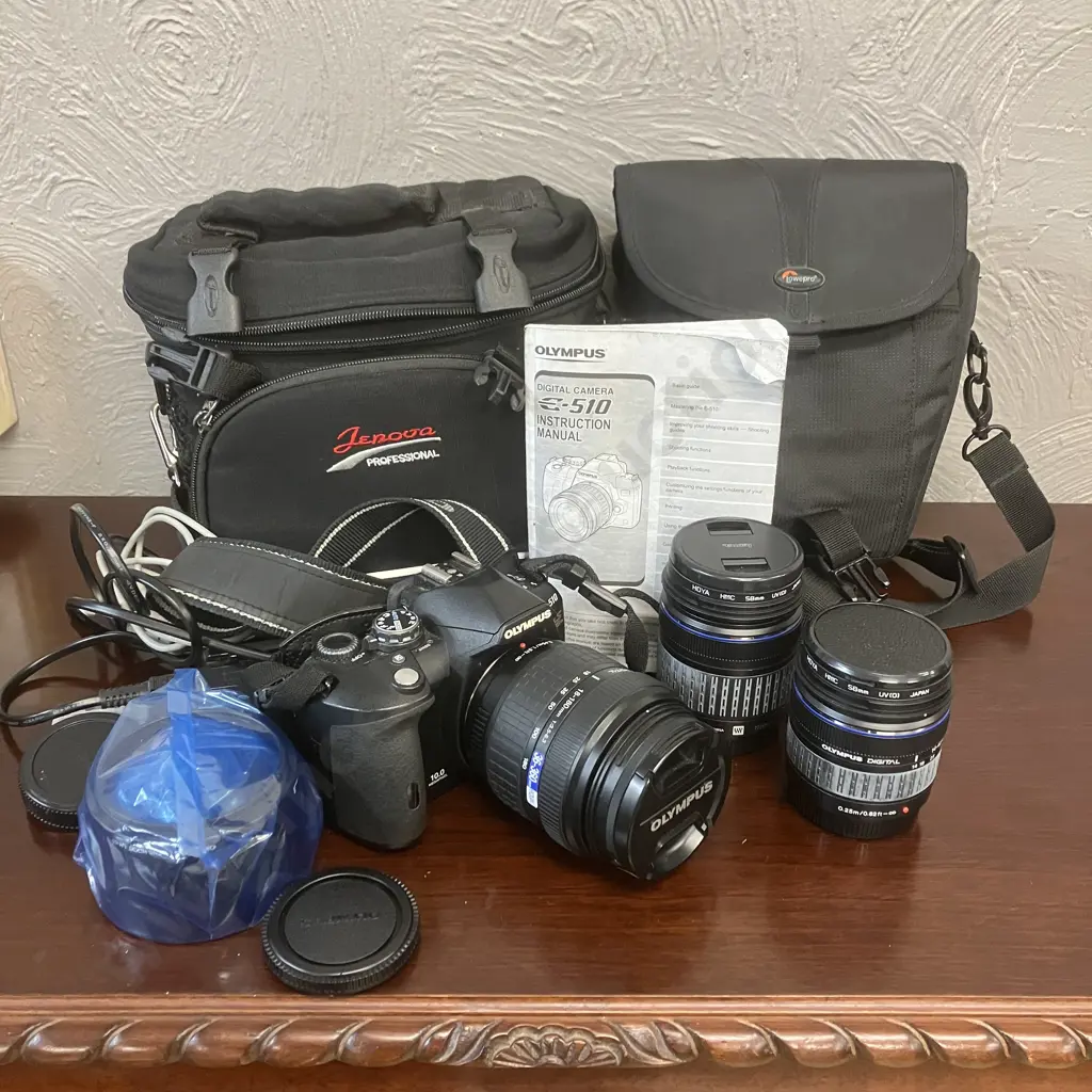 Olympus Evolt E-510 Digital Camera,18-180/3.5-6.3, 40-150/4-5.6, 14-42/3.5-5.6 Lenses, Cases, Manual, Charger, Card Etc Image 1++