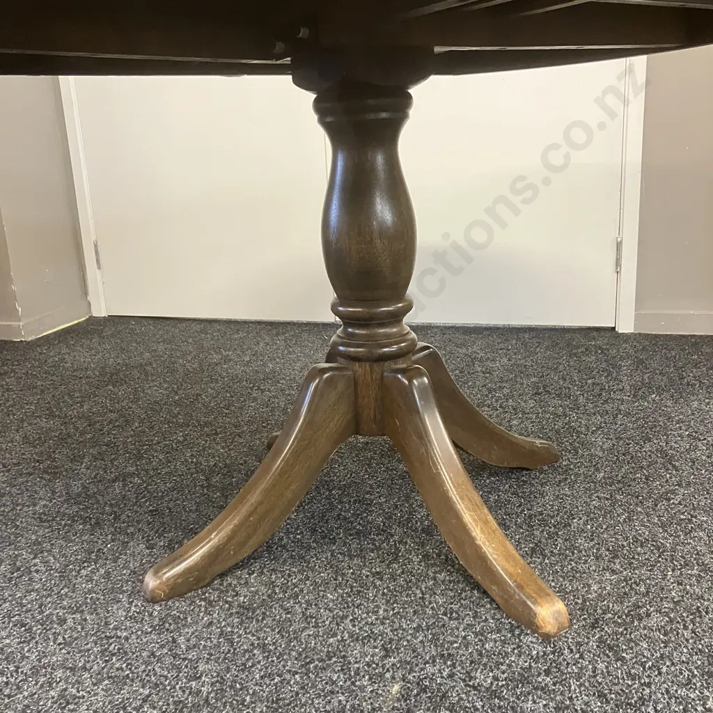 Dark Stained Oak Drop Leaf Table, Turned Single Pedestal Base To 4 Feet. 76 x 120cm Folded Image 1++