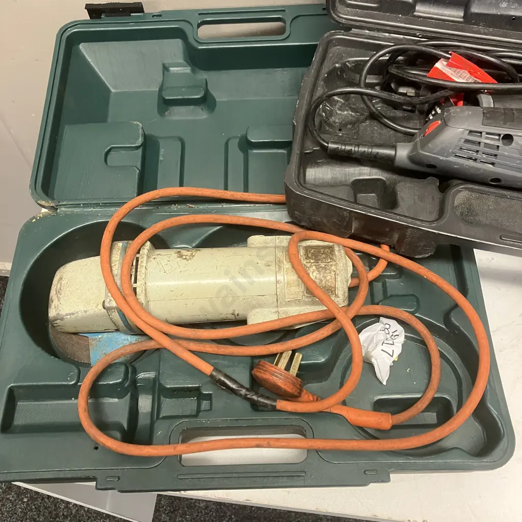 Three Angle Grinders In Plastic Cases Image 1++