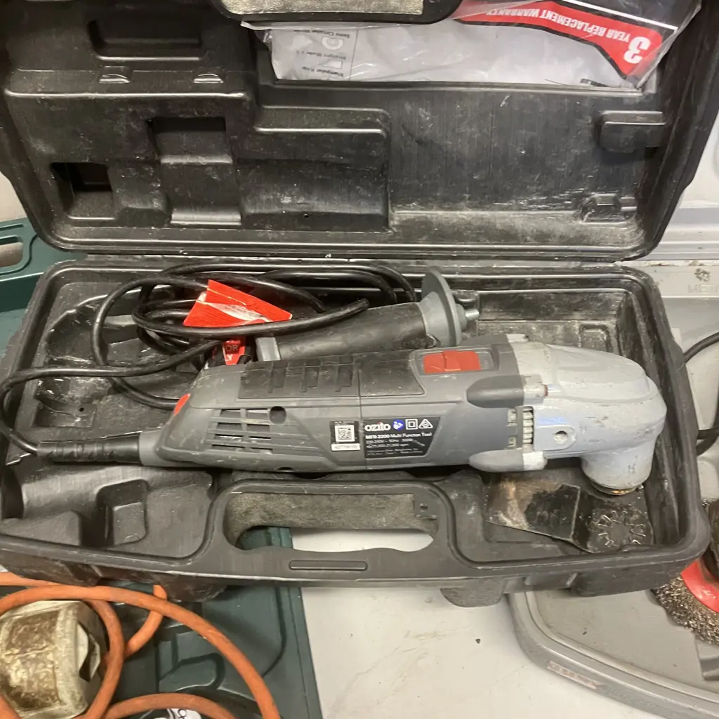 Three Angle Grinders In Plastic Cases Image 1++