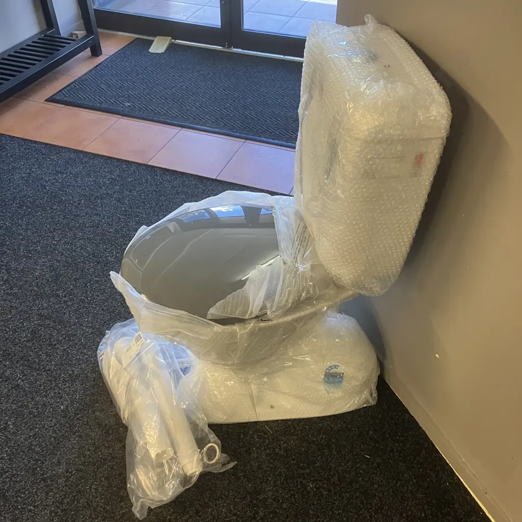 New Caroma Cosmo Sovereign Care Toilet Suite with Grey Soft Close Seat, Extended Mid-Level Flush Pipe Kit - RRP $1289.00 Image 1++