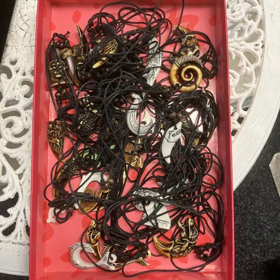 Assorted Pendants On Plaited Cords