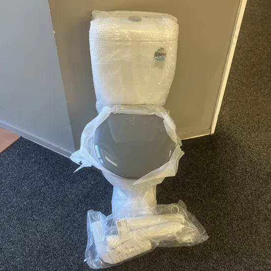 New Caroma Cosmo Sovereign Care Toilet Suite with Grey Soft Close Seat, Extended Mid-Level Flush Pipe Kit - RRP $1289.00