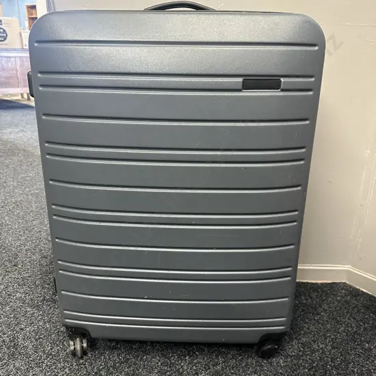 Grey Hardcase Suitcase Retractable Handle On Wheels H75cm.