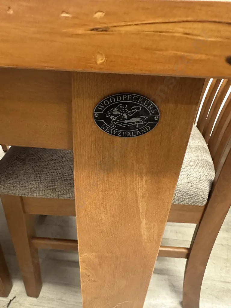 Stunning Woodpeckers Solid Rimu Dining Table (120 x 91cm) With Set of Four Stamped Woodpeckers Dining Chairs Image 1++
