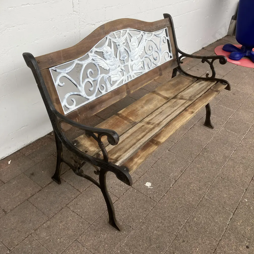 Garden Bench, Cast Ends & Cast Cherub Insert Panel With Wooden Slats. 129.5 x 60cm Image 1++