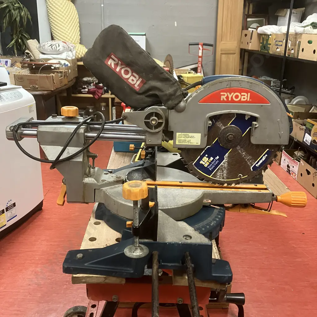 Ryobi EMS2305SCL Dual Bevel Sliding Compound Mitre Saw - 2400 Watt With Work Table Image 1++