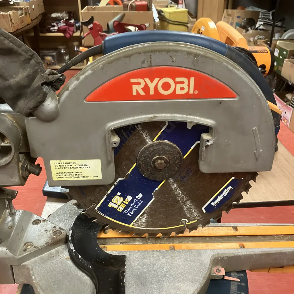 Ryobi EMS2305SCL Dual Bevel Sliding Compound Mitre Saw - 2400 Watt With Work Table Image 1++