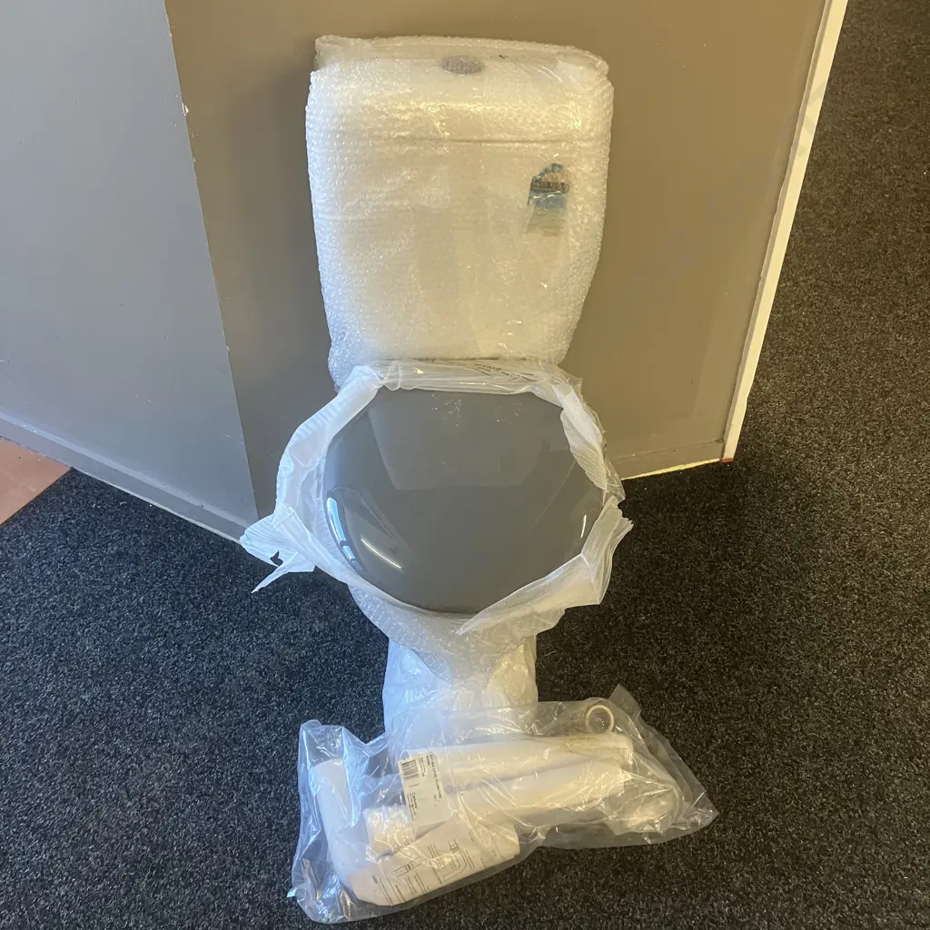 New Caroma Cosmo Sovereign Care Toilet Suite with Grey Soft Close Seat, Extended Mid-Level Flush Pipe Kit - RRP $1289.00 Image 1++