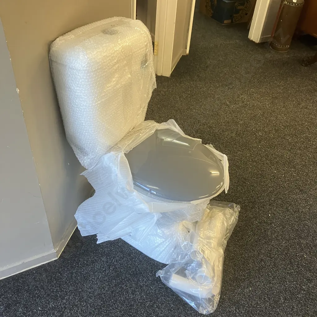 New Caroma Cosmo Sovereign Care Toilet Suite with Grey Soft Close Seat, Extended Mid-Level Flush Pipe Kit - RRP $1289.00 Image 1++