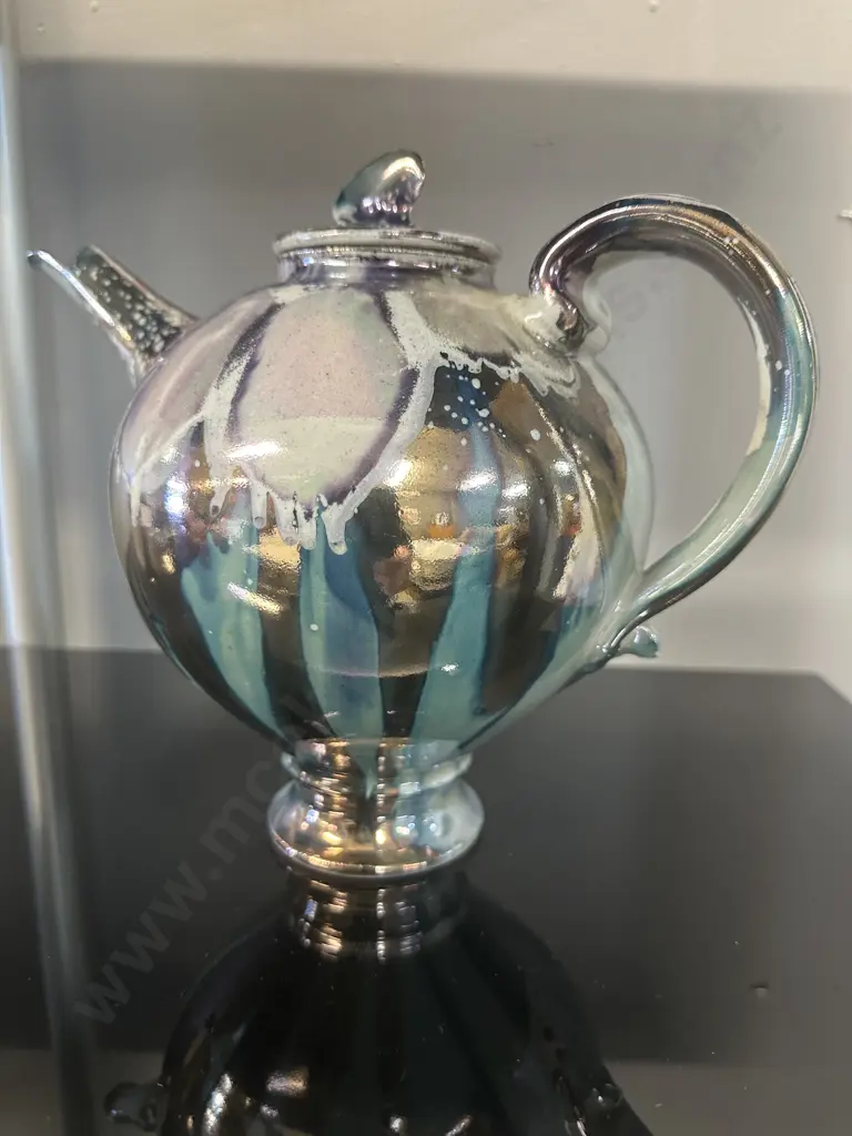 Decorative Teapot With Iridescent Metalic Glaze Reflecting Blue, Purple & Silver With A finial On Lid Image 1++