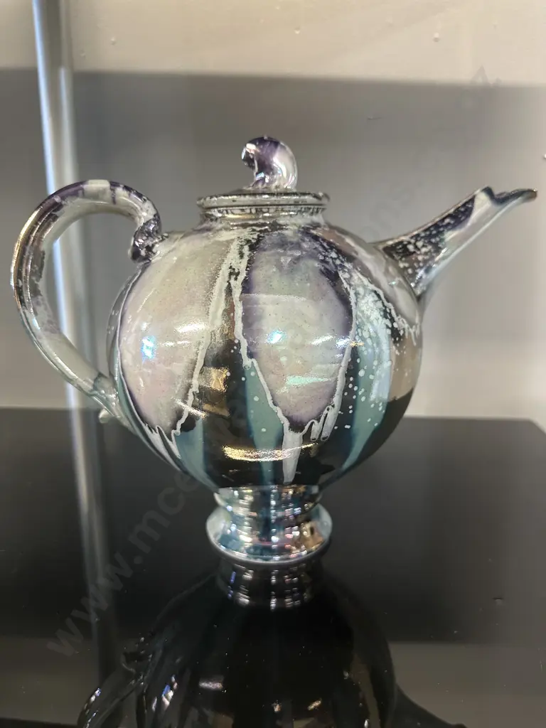 Decorative Teapot With Iridescent Metalic Glaze Reflecting Blue, Purple & Silver With A finial On Lid Image 1++