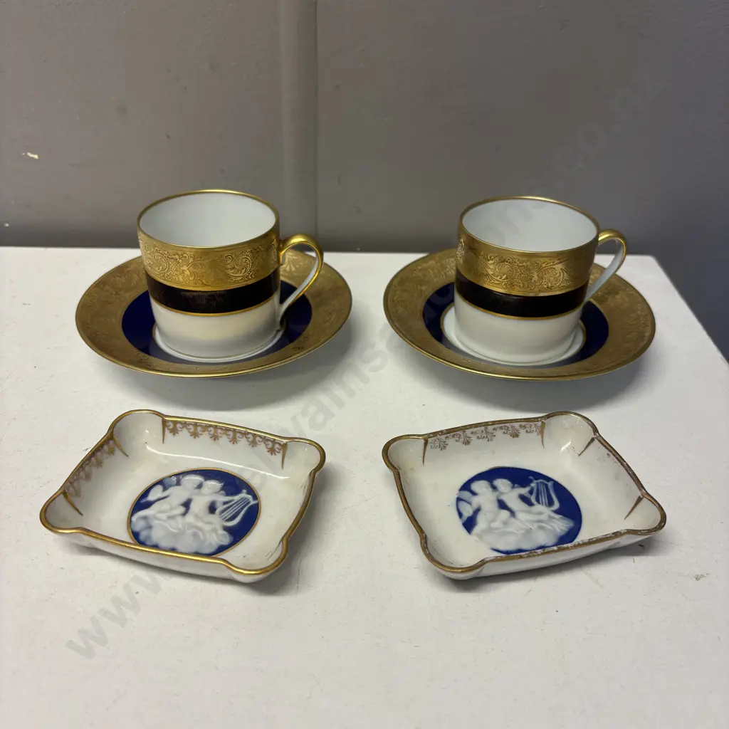 Pair of Limoge heavy gilded trim demi-tasse cups and saucers with two pate-sur-pate dishes Image 1++