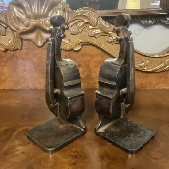 Pair of Vintage Heavy Metal Cello Bookends. H28cm