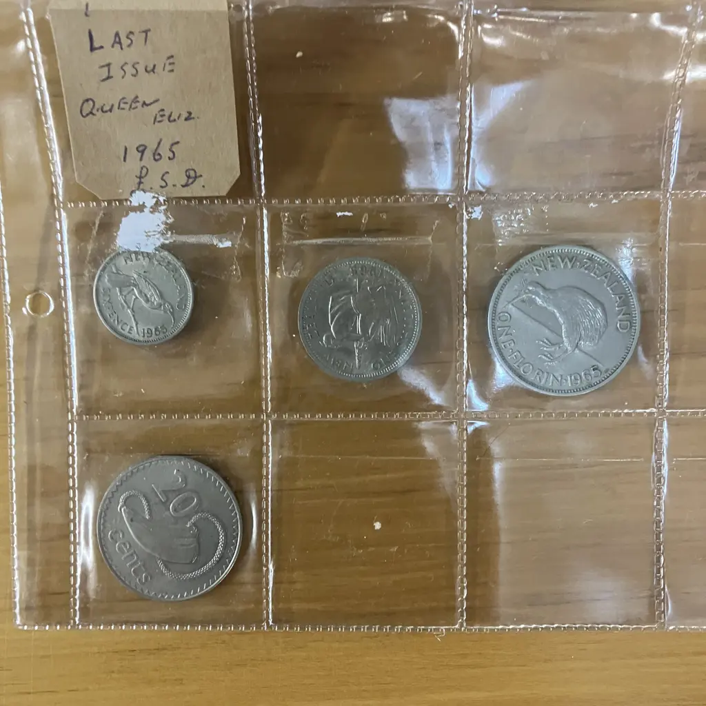New Zealand Coins - Queen Elizabeth The Second 1964 & 1965 With 1975 Fiji 20 Cent Coin Image 1++