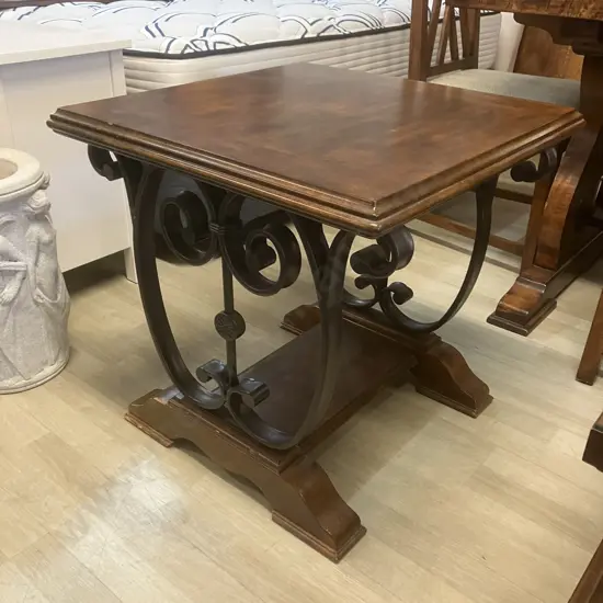 Wooden End Table On Ornate Steel Base. 64 x 65cm