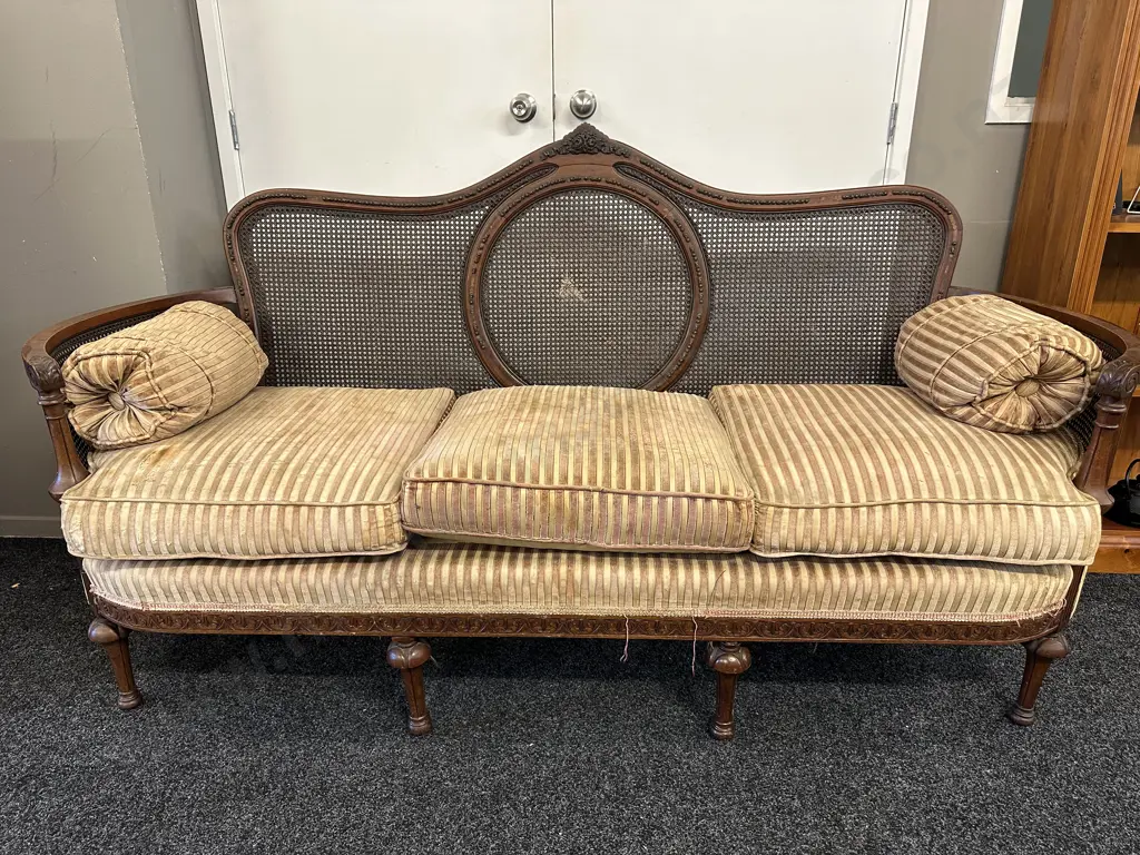Bergere Cane Upholstered 3 Seater Sofa. 4 Legs In Front, Ornately Carved, Curved Arms (As Found) Image 1++