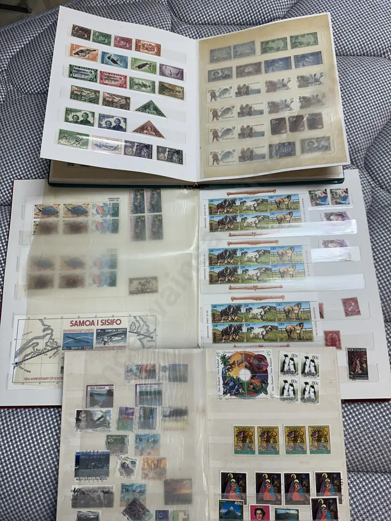 Fly Eagle Stamp Albums With Over 200 Assorted Stamps Etc Image 1++