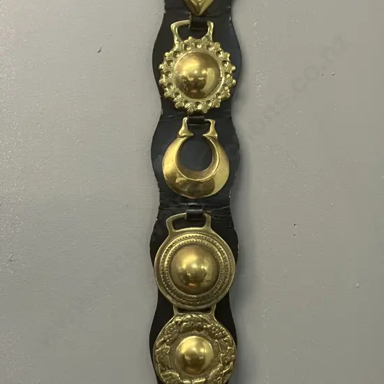 Vintage Six Horse Brasses Mounted On a Brown Leather Strap. L85cm