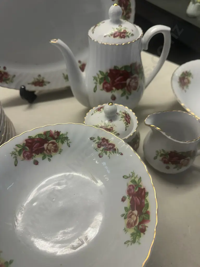 Eight Piece Setting Dinnerware White With Floral Detail Image 1++