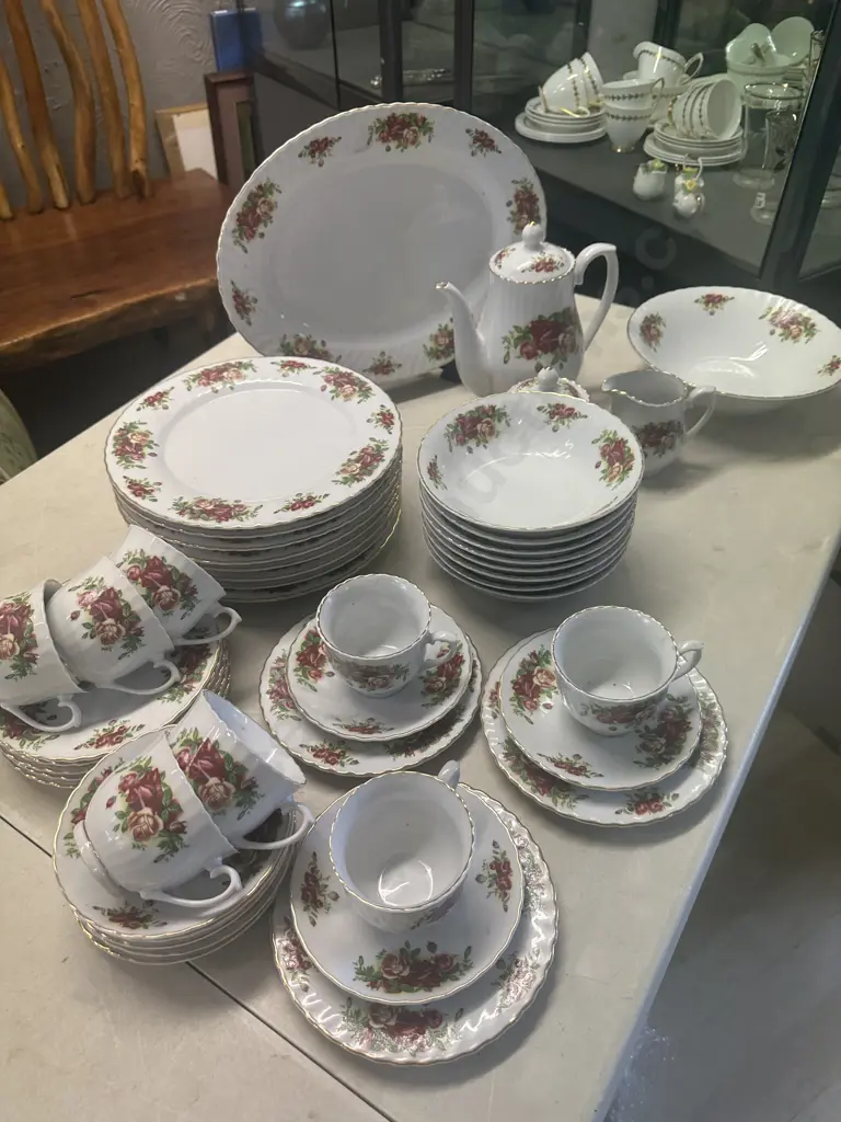 Eight Piece Setting Dinnerware White With Floral Detail Image 1++