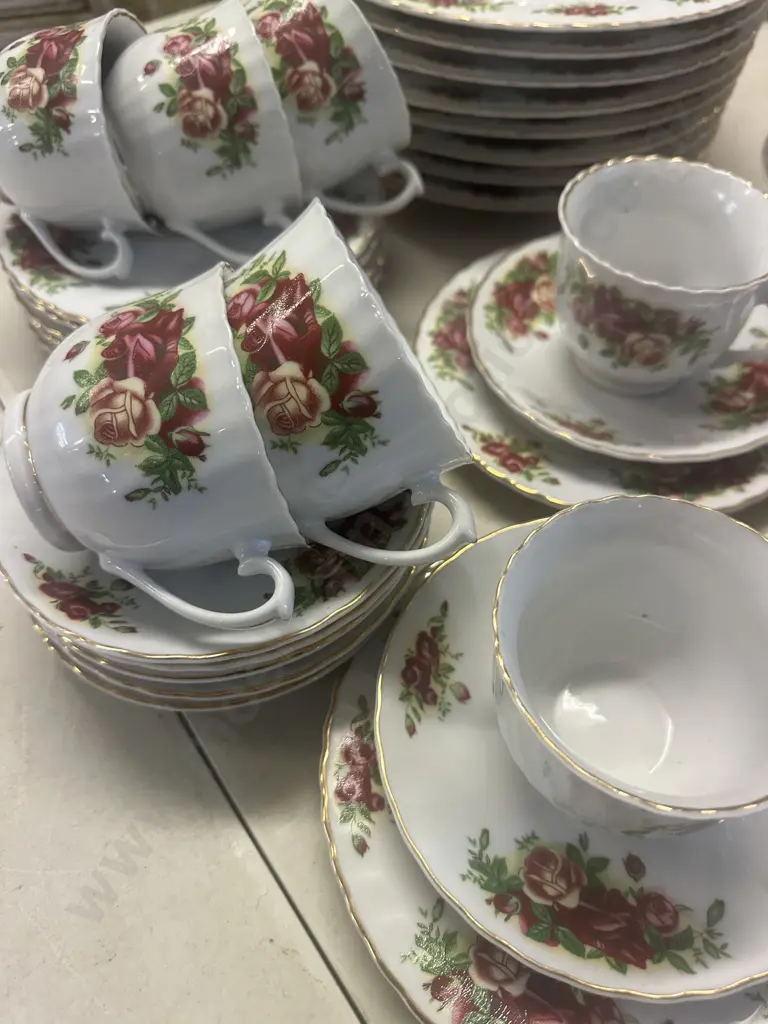 Eight Piece Setting Dinnerware White With Floral Detail Image 1++