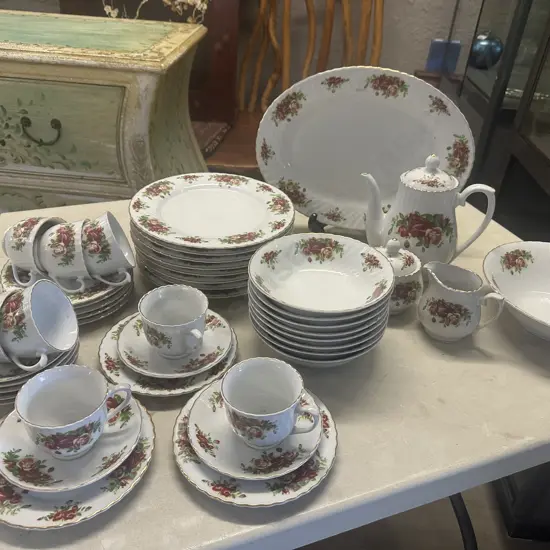 Eight Piece Setting Dinnerware White With Floral Detail