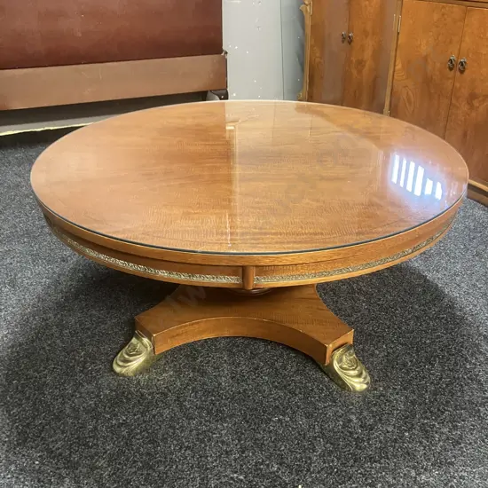 Round Coffee Table On Turned Pedestal With 4 Cast Gilt Pad Feet, Glass Top. 47 x 99cm