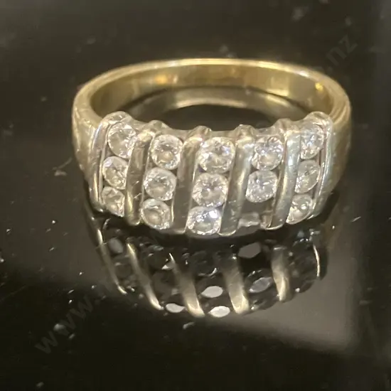 18ct Gold And Channel-Set Diamond Ring Weight 5.7grams With 14 Diamonds (Missing 1 Diamond)