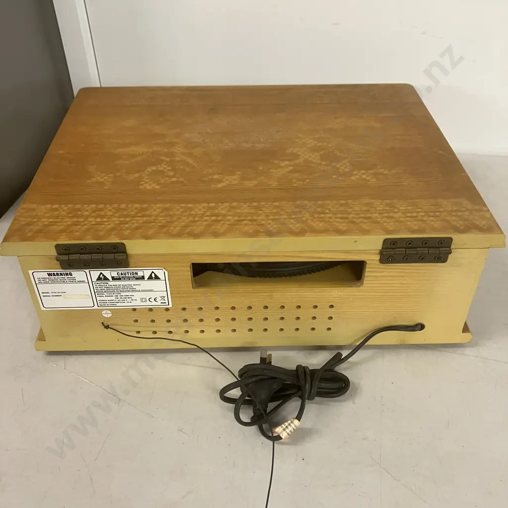 Phonograph With AM/FM Radio - Model X122 Image 1++
