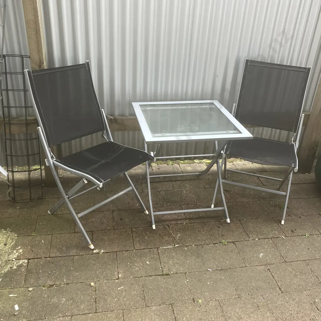 Steel & Glass Top Folding Patio Table With 2 Black Chairs Image 1++