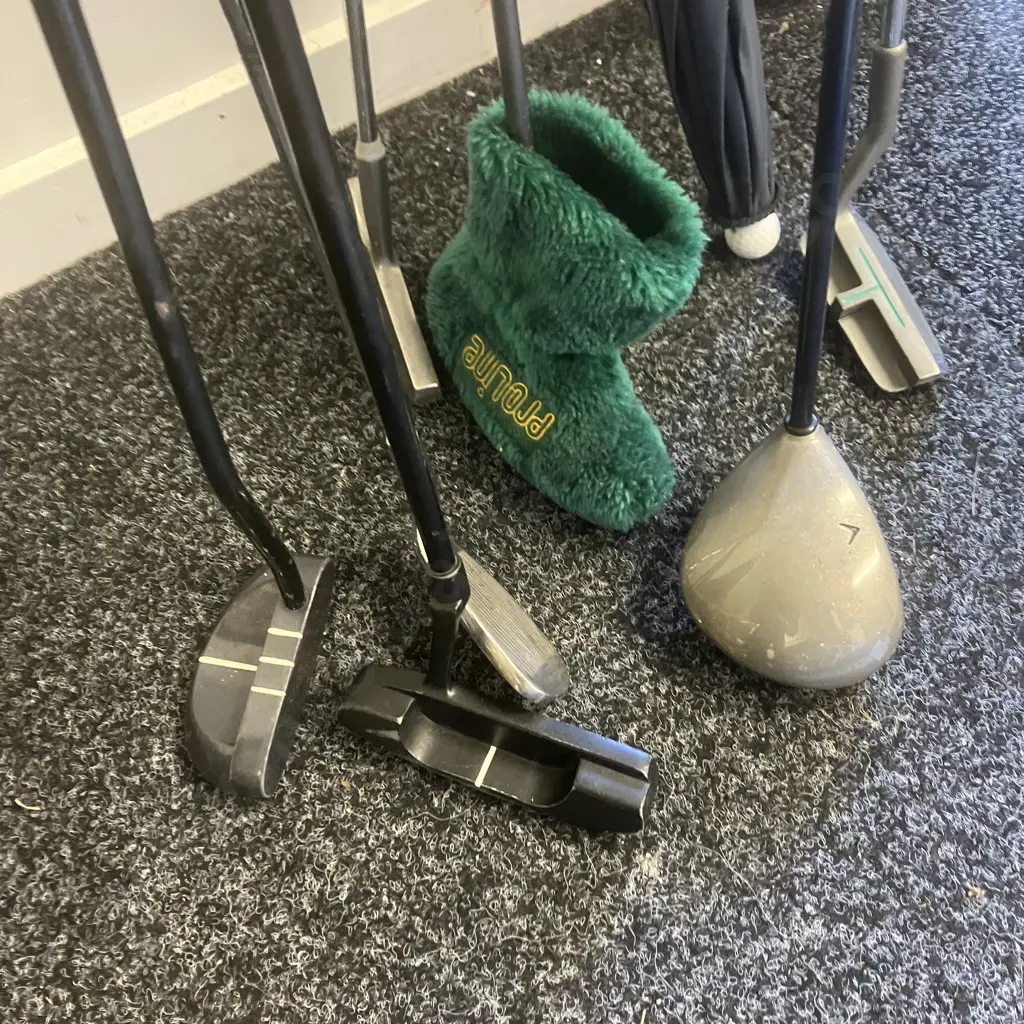 Assorted Golf Clubs With Drizzle Stick Image 1++