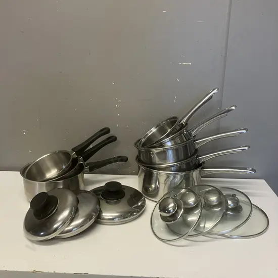 Eight Pots With Seven Lids