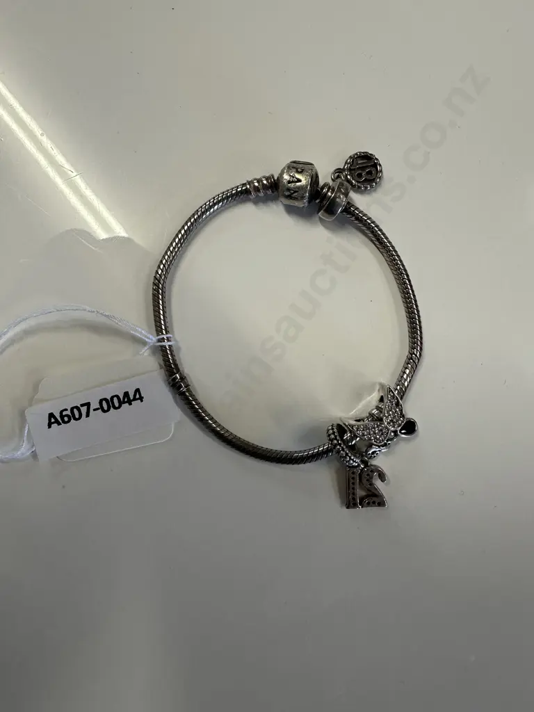 Pandora Bracelet With Three Charms - 21, 18 & Butterfly Image 1++