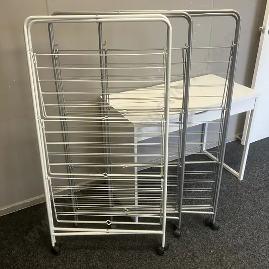 Three Folding Clothes Drying Racks On Wheels