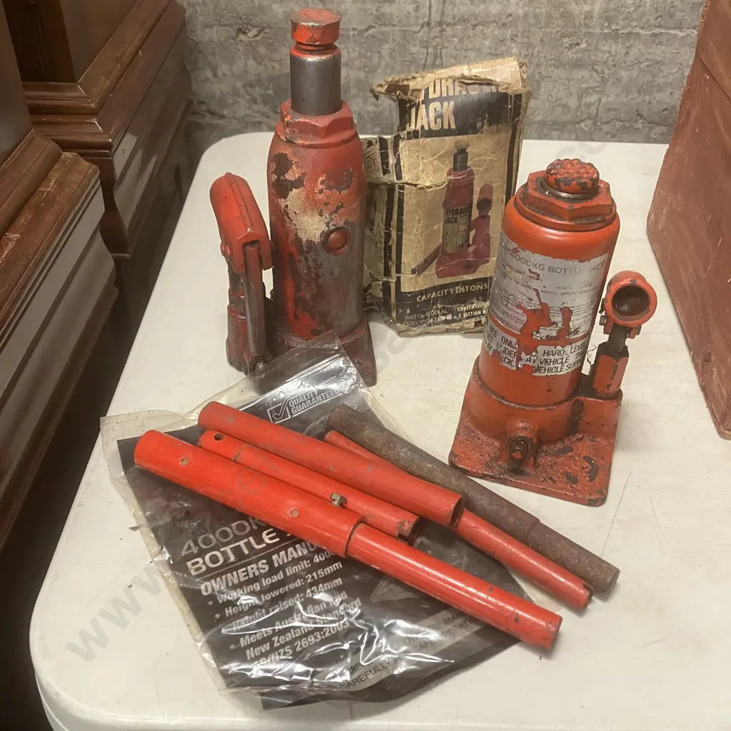 Three Assorted Bottle Jacks IN Wooden Box Image 1++