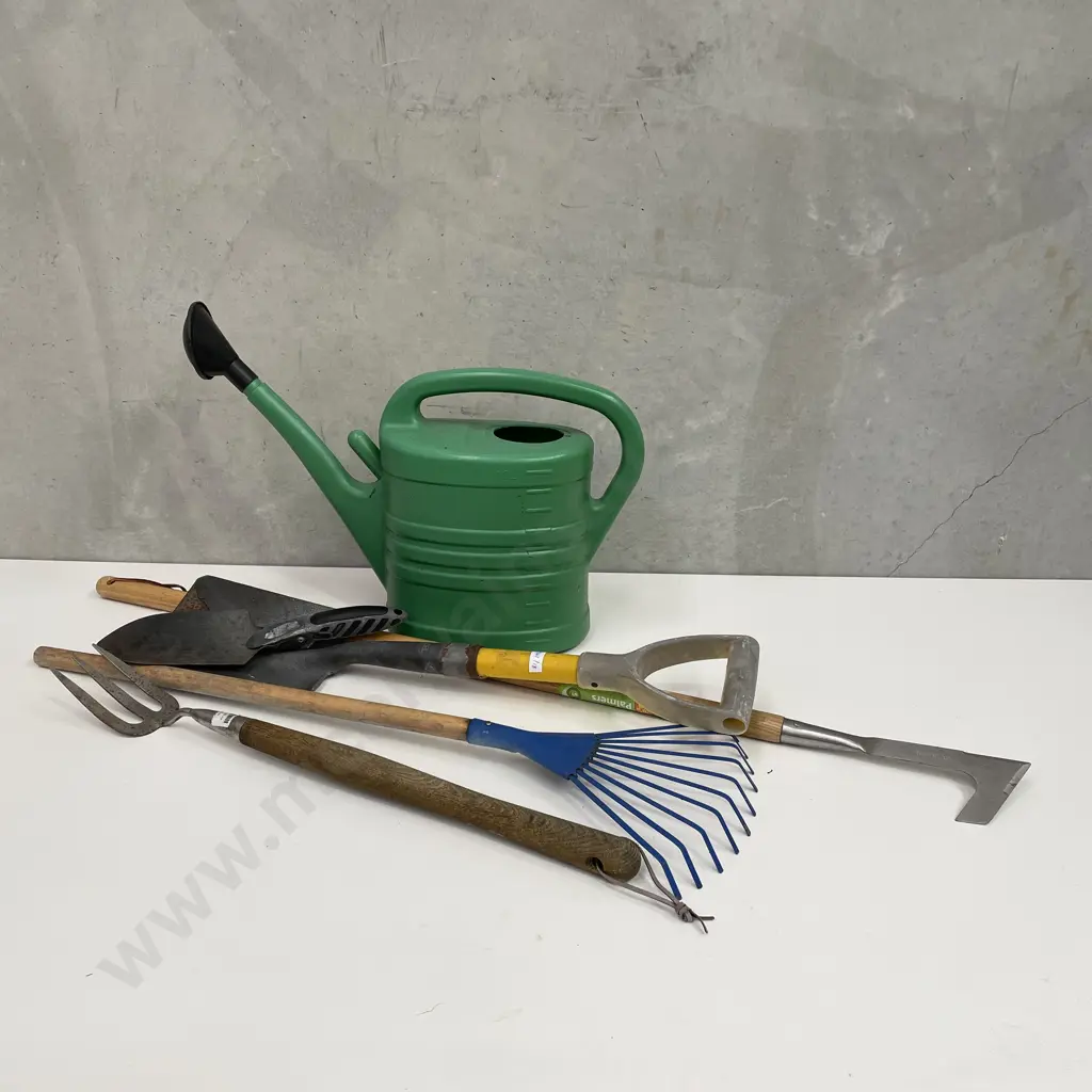 Assorted Gardening Tools and Watering Can Image 1++