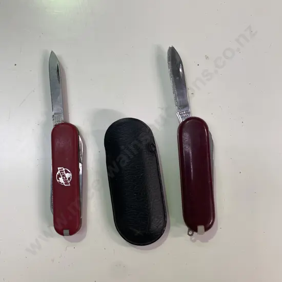 Bechtel Vitorinox Switzerland Small Pocket Knife in cover with one other small Stainless Pocket Knife