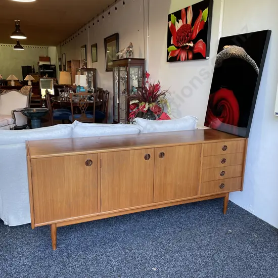 Mid Century Parker Nordic Teak? Sideboard. 4 Drawer, 3 Door. 1 Back leg need repair.