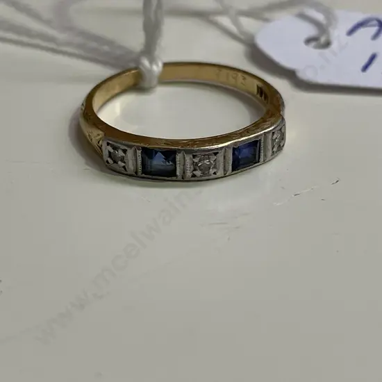 18ct Gold with diamond and blue stone ring