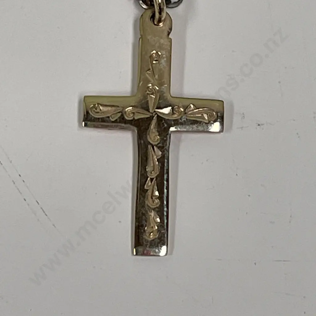 9ct Gold Cross, Stamped 375 with silver coloured chain Image 1++