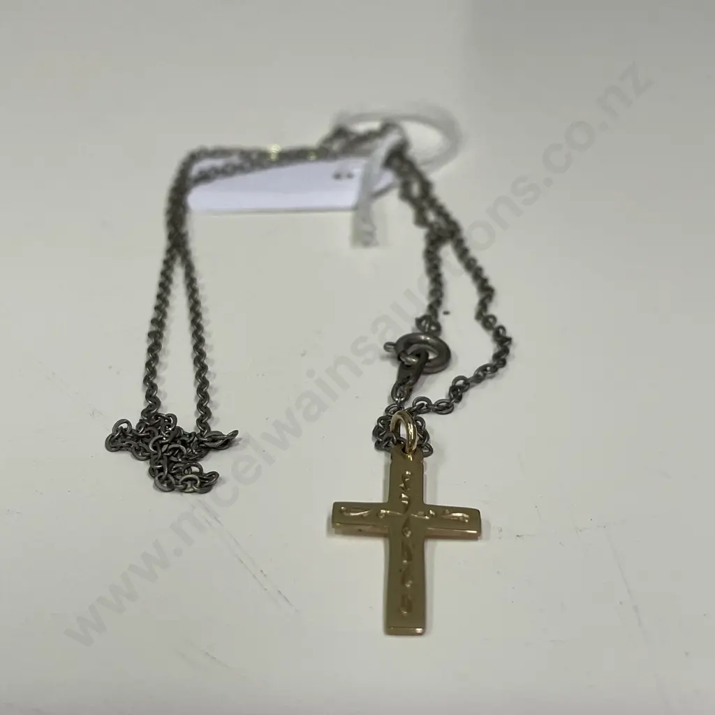 9ct Gold Cross, Stamped 375 with silver coloured chain Image 1++