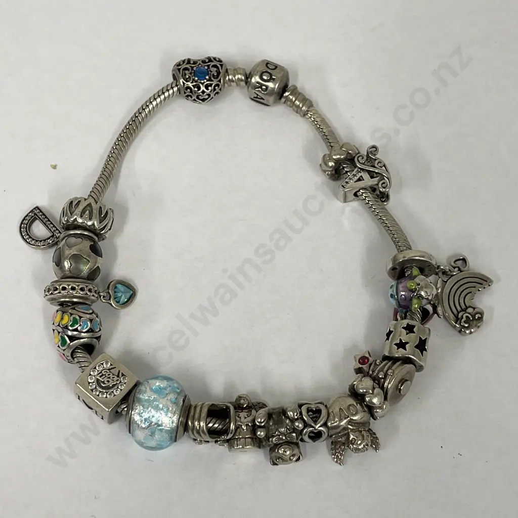 Pandora Bracelet with large assortment of Charms Image 1++