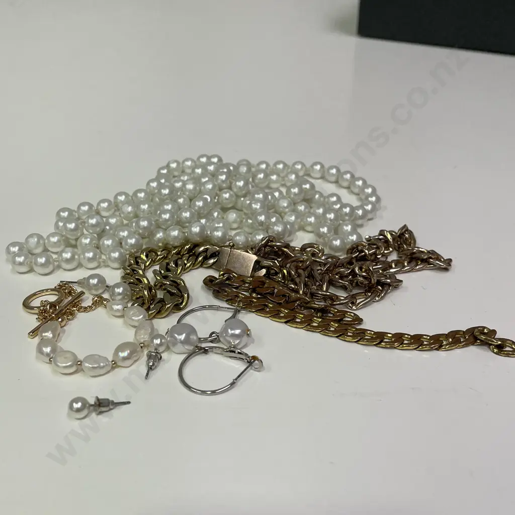 Two Gold Coloured Chains with assorted pearl jewellery Image 1++